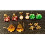 A pair of 9ct gold bell drop earring; others 9ct gold pearl studs, diamond and ruby clusters, flower
