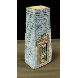 A Troika Cornwall chimney vase, decorated with a blue textured body and etched abstract shapes and