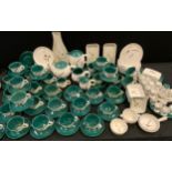 Denby ‘Green wheat’ pattern table ware including; 31 tea cups and saucers (some spare tea cups),