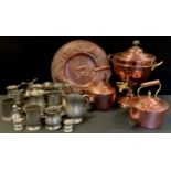 An Art & Crafts copper charger, embossed with Fish; samovar. copper kettles; pewter jugs,