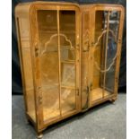 A Chinoiserie china display cabinet, walnut veneer with lacquered decoration depicting figures and