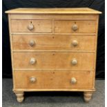 A Victorian pine chest of drawers, two short over three graduated long drawers, turned feet, 105.5cm