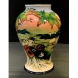 A Moorcroft Swaledale pattern vase designed by Phillip Gibson, decorated with shepherd, his flock