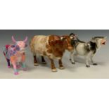 A Cow Parade Patchwork Cow, 6012, Thomas Beswick Durham Ox, with plinth, a German Cow Creamer (3)