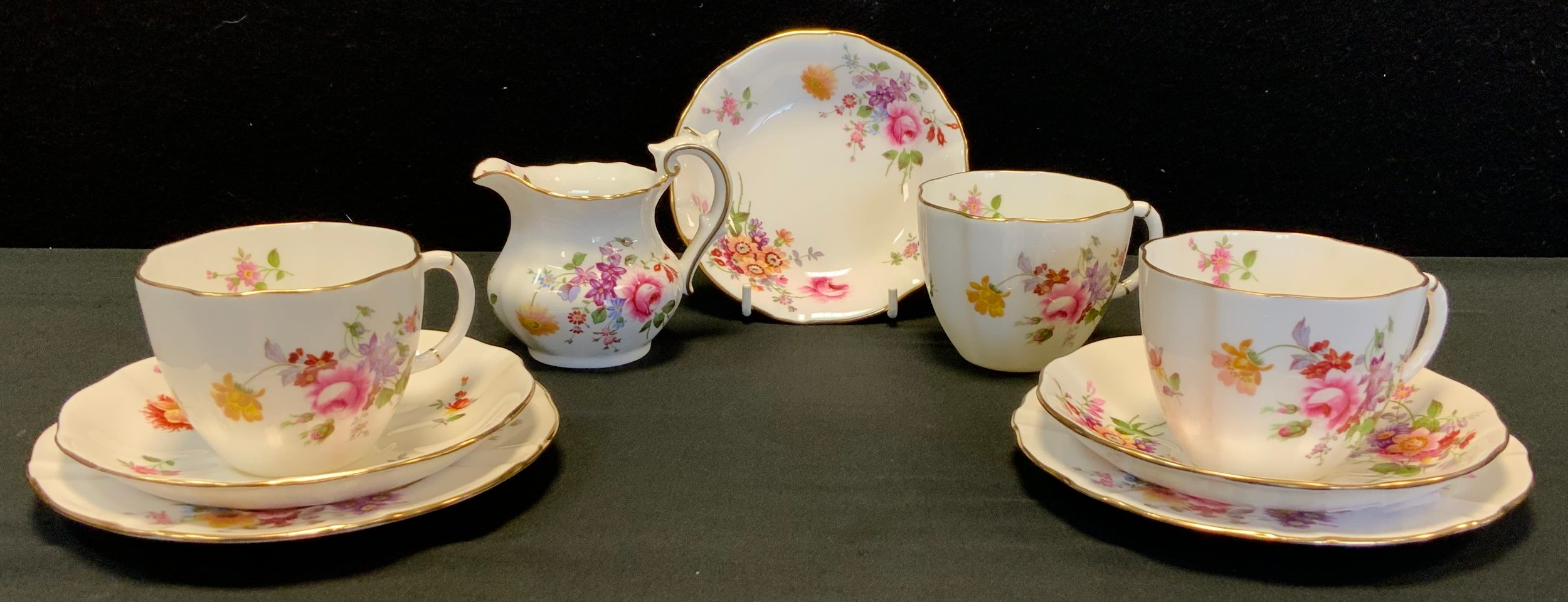 Royal Crown Derby 'Derby posie' tea set for two comprised of; two tea cups and saucers, milk jug,