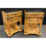 A pair of Empire style burr walnut and beechwood bedside cabinets/side tables, inset black marble
