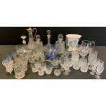 Glass - cut bottle decanters, four Greek key patterned wine glasses, four engraved tumblers, blue