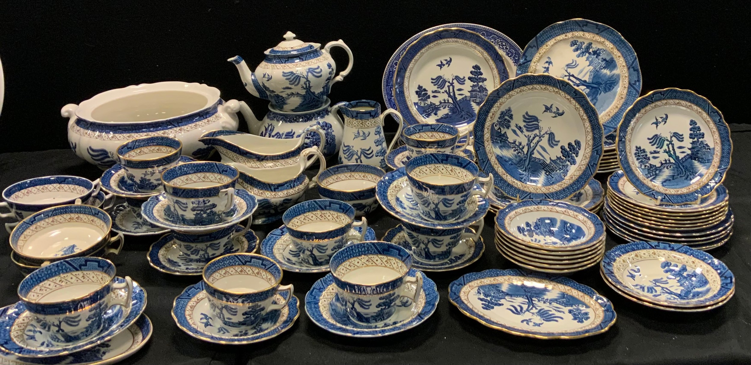 Booths 'Real Old Willow' pattern table ware including; six dinner plates, six smaller, tea pot, milk