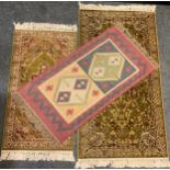 A Middle Eastern Kashan style rug / carpet, wool and silk mix, knotted in green, burgundy, and