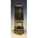 Iron and brass miners lamp, Rg no.2228,25cm high