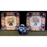 Oriental ceramics - a pair of 20th century Japanese square Imari plates, 32cm diameter, a Chinese