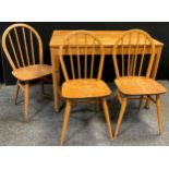 Mid century design - a set of three Lucian Ercolani, for Ercol, spindle-back dining chairs, elm