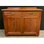 An early 20th century Arts and Crafts style walnut sideboard, 94cm high x 120cm wide x 44.5cm deep.