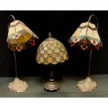 A pair of Tiffany style table lamps, stained glass shades, another (3)