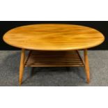 An Ercol, Blonde Elm, oval coffee table, mid century design, turned legs, spindle under-tier, 44.5cm