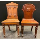 A Victorian oak hall chair, architectural shaped pediment cresting to carved back, shaped apron to