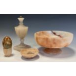 Geology interest - a carved pedestal alabaster bowl, 23cm diameter ,table lamp, egg holder; etc (4)