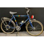 A vintage Falcon bicycle, Terrain model, in metallic blue, 15 gears.