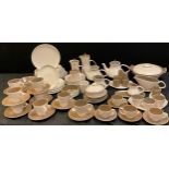 A Poole mushroom and sepia pattern part table service including; eleven dinner plates, two tea pots,
