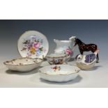 A 19th century copy Augustus Rex miniature quatrefoil tea cup and saucer, mark to base; Beswick