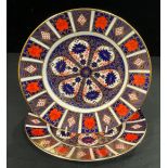A Royal Crown Derby Imari 1128 dinner plate, first quality, 27cm, printed marks in red; another,