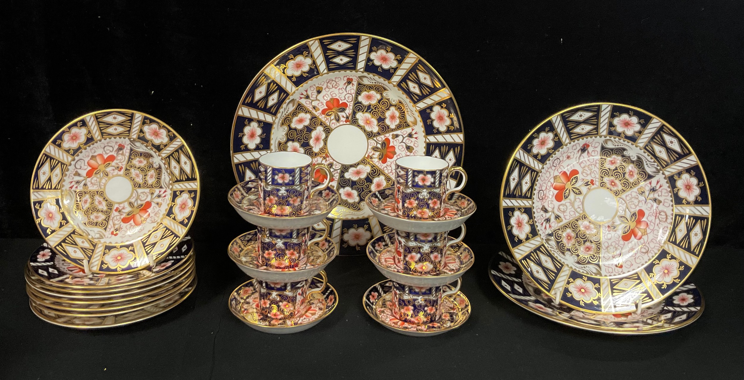 A set of six Royal Crown derby Imari 2451 pattern coffee cans, saucers and side plates; a 2451