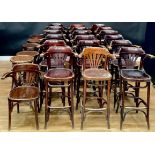 A harlequin suite of bentwood fan back bar chairs; stools, etc (24)