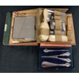 A George V silver hafted three piece dressing set, including button hook, glove stretchers and