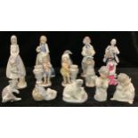 A Lladro figure, Sad Sax, 5471, 23cm high; others, Cat and Mouse, Duck and Ducklings, Cherubs, Polar