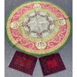 A large circular woollen rug or carpet, floral swags and reserves with urns and flowers, in shades