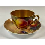 A Royal Worcester cabinet cup and saucer, decorated by B Cox, signed, painted with ripe fruit on a