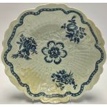 An 18th century Worcester basket weave shaped circular bowl, painted in underglaze blue with