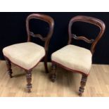 A pair of Victorian mahogany balloon back dining chairs, 83.5cm high, 45cm wide, 41cm deep