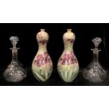 A pair of gourd shaped vases by Thomas Forester and Sons, England, decorated with flag irises, 31.