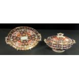 A Royal Crown Derby Imari 2451 pattern two handled oval sauce tureen on stand, the base 23cm wide,