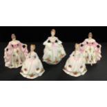 A Royal Doulton figure, Country Rose HN 3221; another pair Kathryn HN 4948, printed with Old Country
