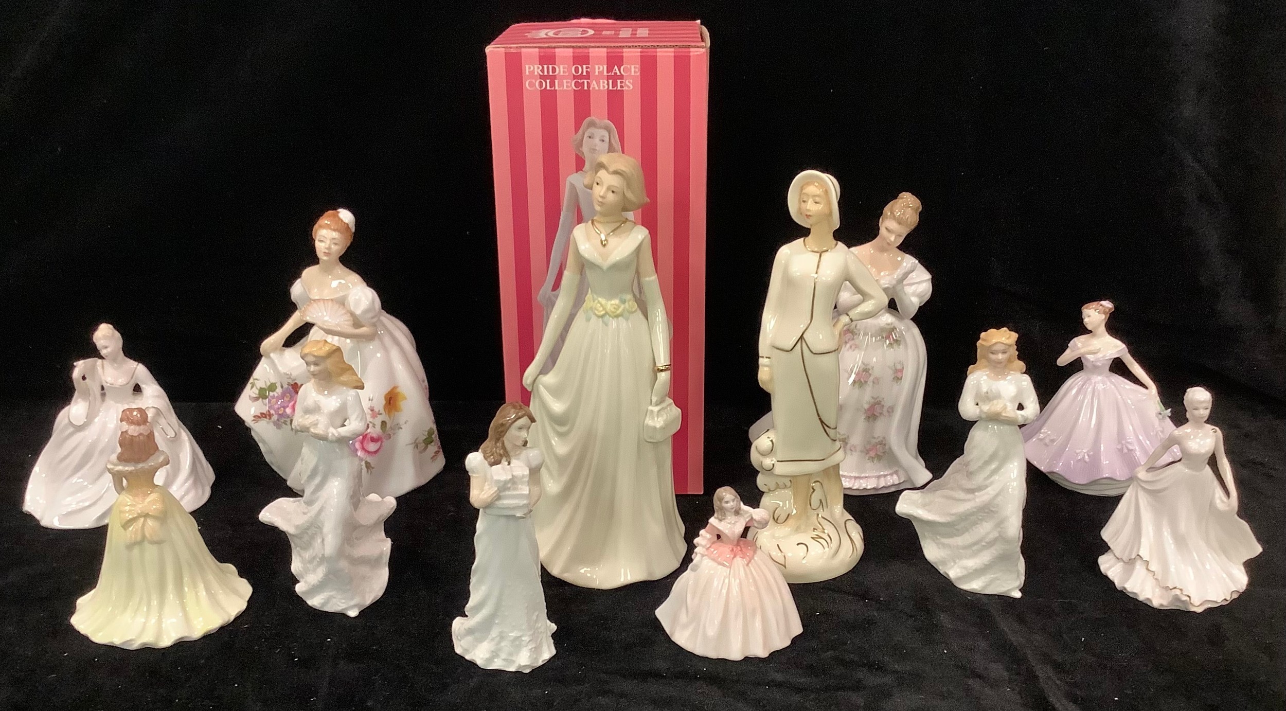 A Royal Doulton figure, Marilyn, printed in the Posie pattern, HN 3002; others, Summer Rose HN 3309,