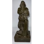 Russian School, a bronze figure of a Soviet worker, holding a sheaf of corn, 32cm high