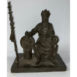 A large bronze figure, of a seated Shaman, 33cm high