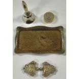 A George V silver dressing table trinket tray, Birmingham 1930; a silver hafted table bell; a silver