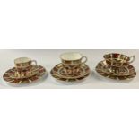 A Royal Crown Derby Imari 1128 pattern teacup, saucer and tea plate, first quality; an 1128 pedestal