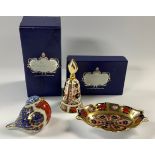 A Royal Crown Derby Imari 1128 pattern oval trinket dish, solid gold band, first quality, boxed;