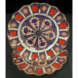 A pair of Royal Crown Derby Imari 1128 pattern shaped circular dessert plates, first quality, 22cm