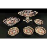 A Royal Crown Derby Imari 2451 pattern pedestal shaped oval comport, pair of acorn handles,