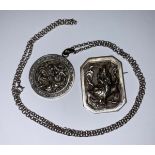 A Chinese silver dragon pendant on chain; a Chinese silver brooch
