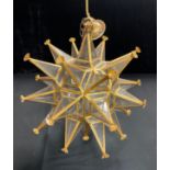 A clear glass and gilt metal starburst lantern, 41cm high, suspension chain
