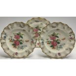 A pair of Royal Crown Derby Derby Days pattern shaped circular plates, 25.5cm, seconds; another,