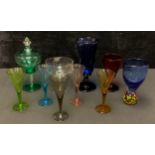 A set of five harlequin drinking glasses, mid-20th century; an Italian Murano blue glass ball base