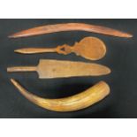 A Boomerang, a cattle horn; a treen bat, etc (4)