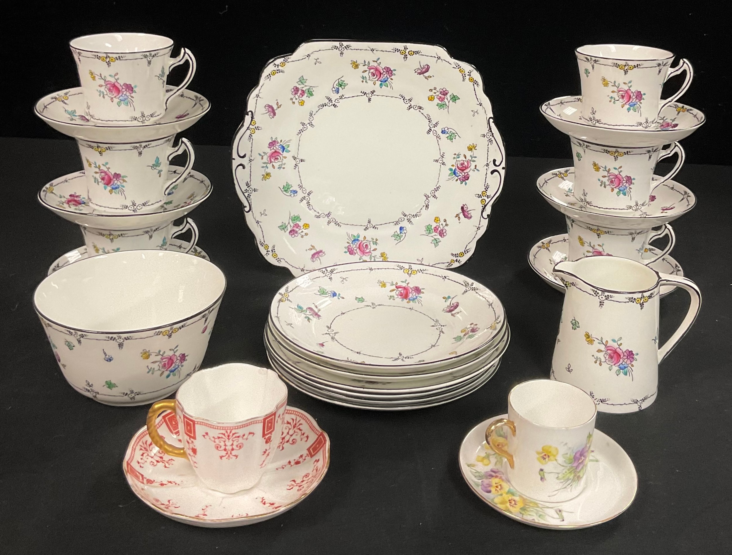 An early 20th century Wellington China tea set for six; a Royal Crown Derby coffee cup and saucer;